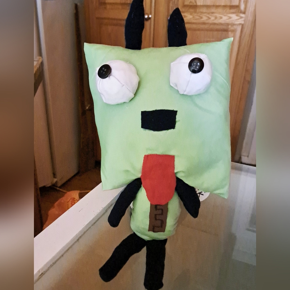 GIR is Hyperactive Insane Robotic Side Kick Of Zim  He Is 16" Tall 8" Wide